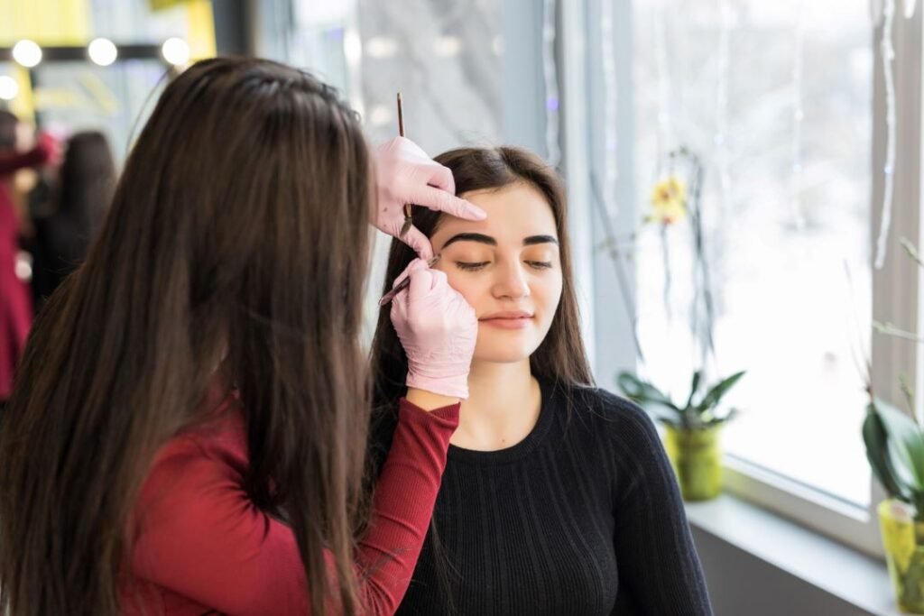 Choosing a licensed permanent makeup artist during a studio consultation